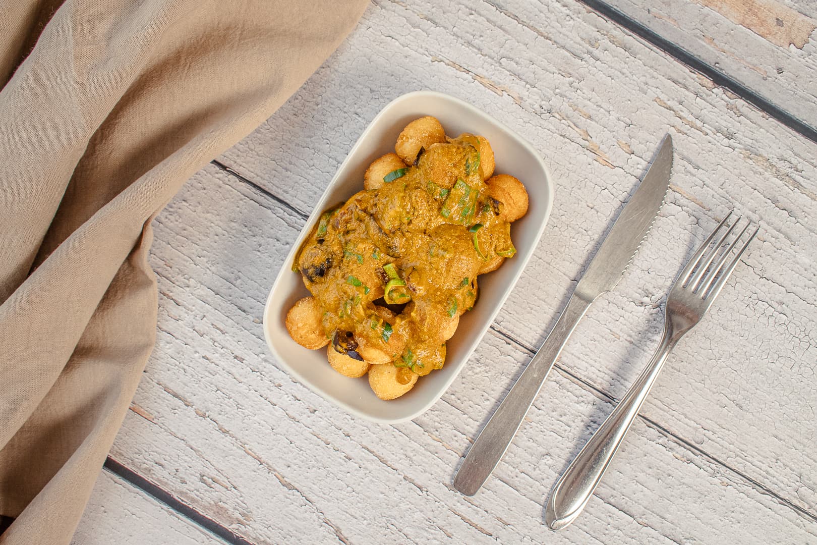 Papas noisette con salsa mediterránea